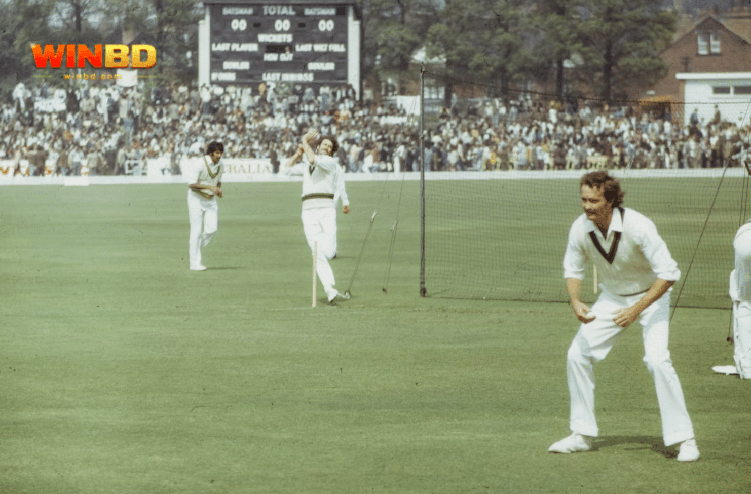 a group of men playing cricket